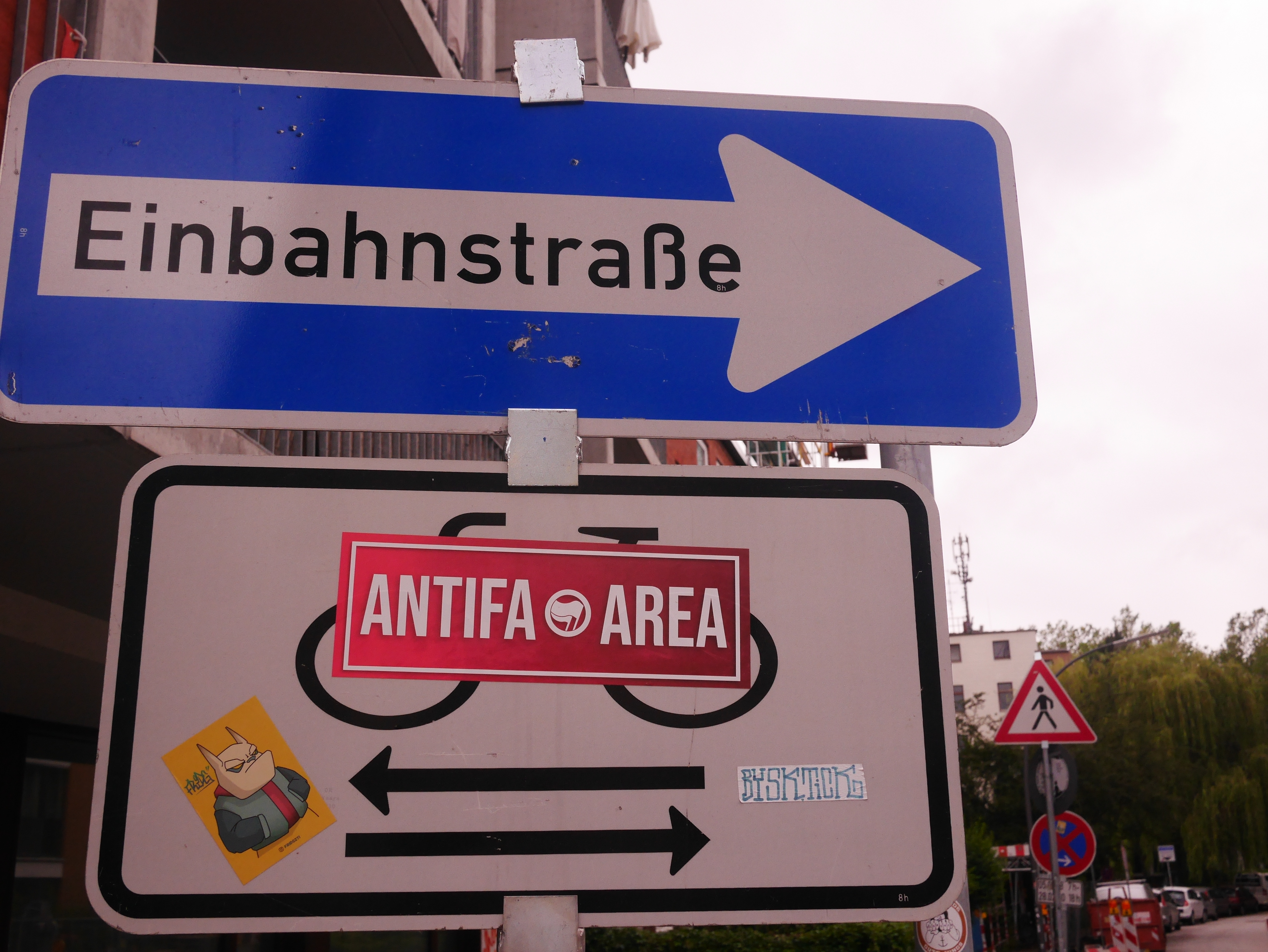 "Antifa Zone" sticker on a road sign